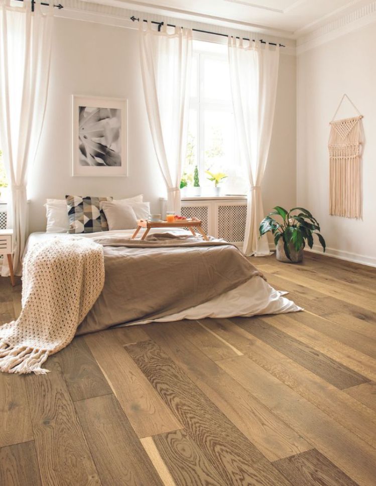 hardwood floor refinishing services for a bright Seattle bedroom