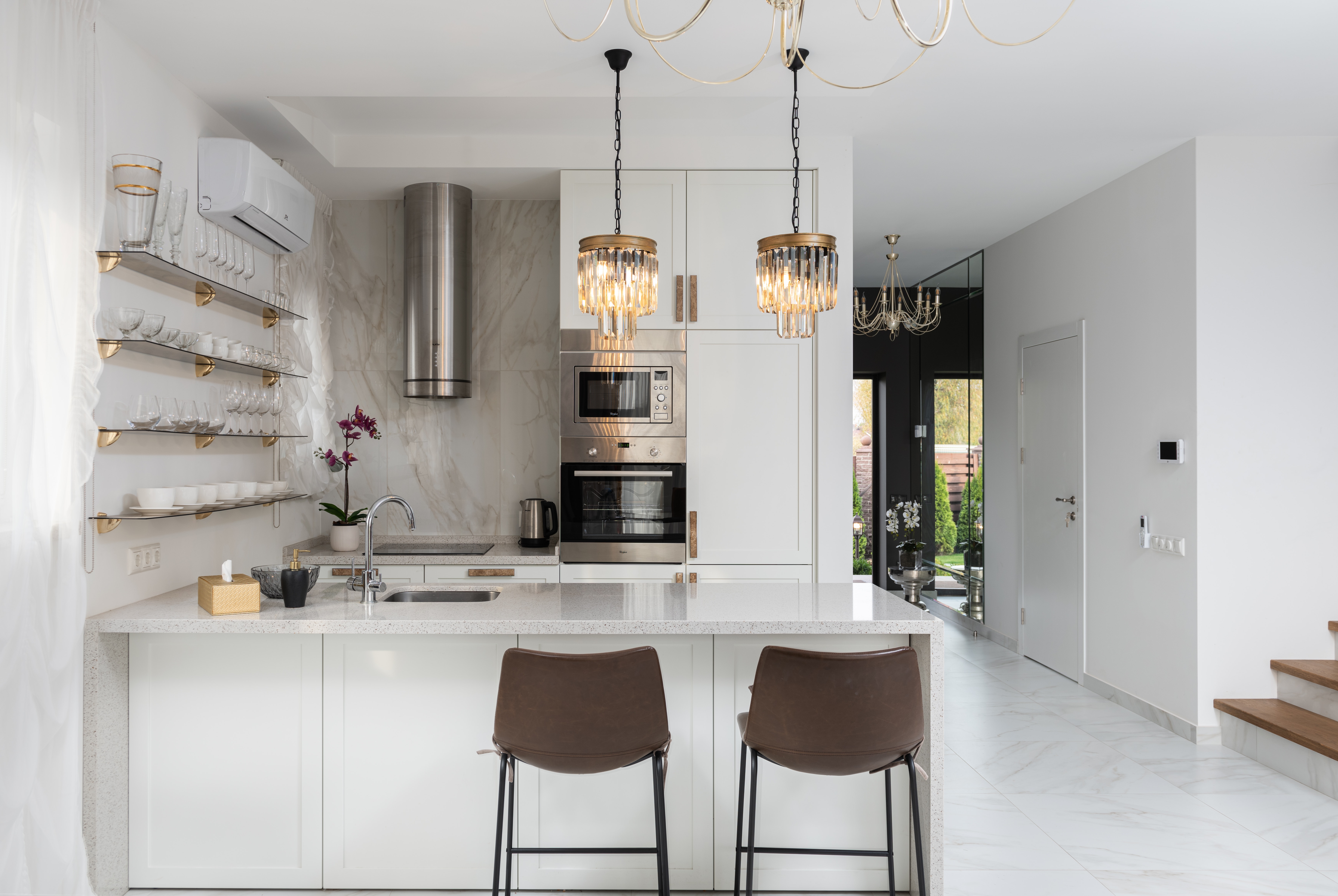 Stock Photo featuring white marble kitchen with designer elements.