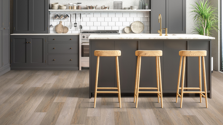 luxury vinyl plank flooring in a spacious kitchen with island