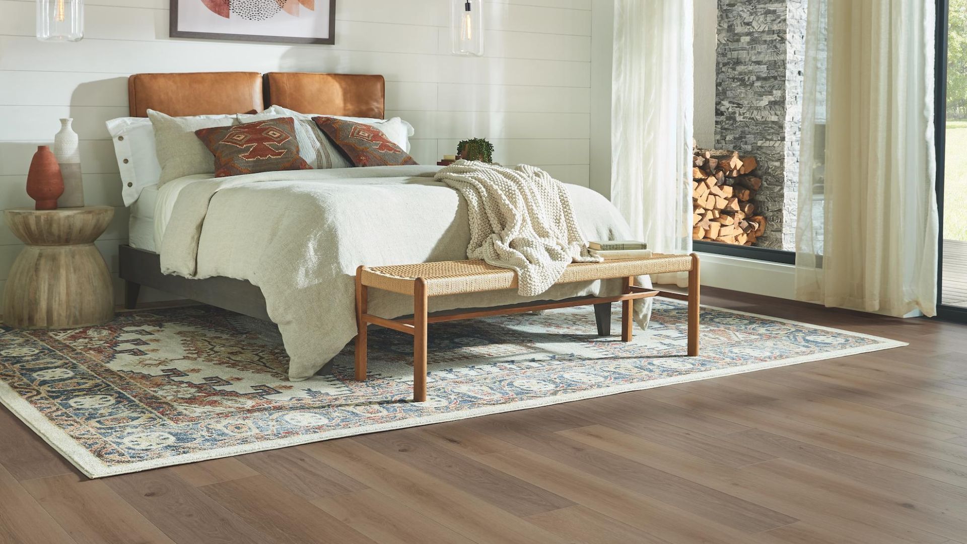large patterned area rug in a bedroom
